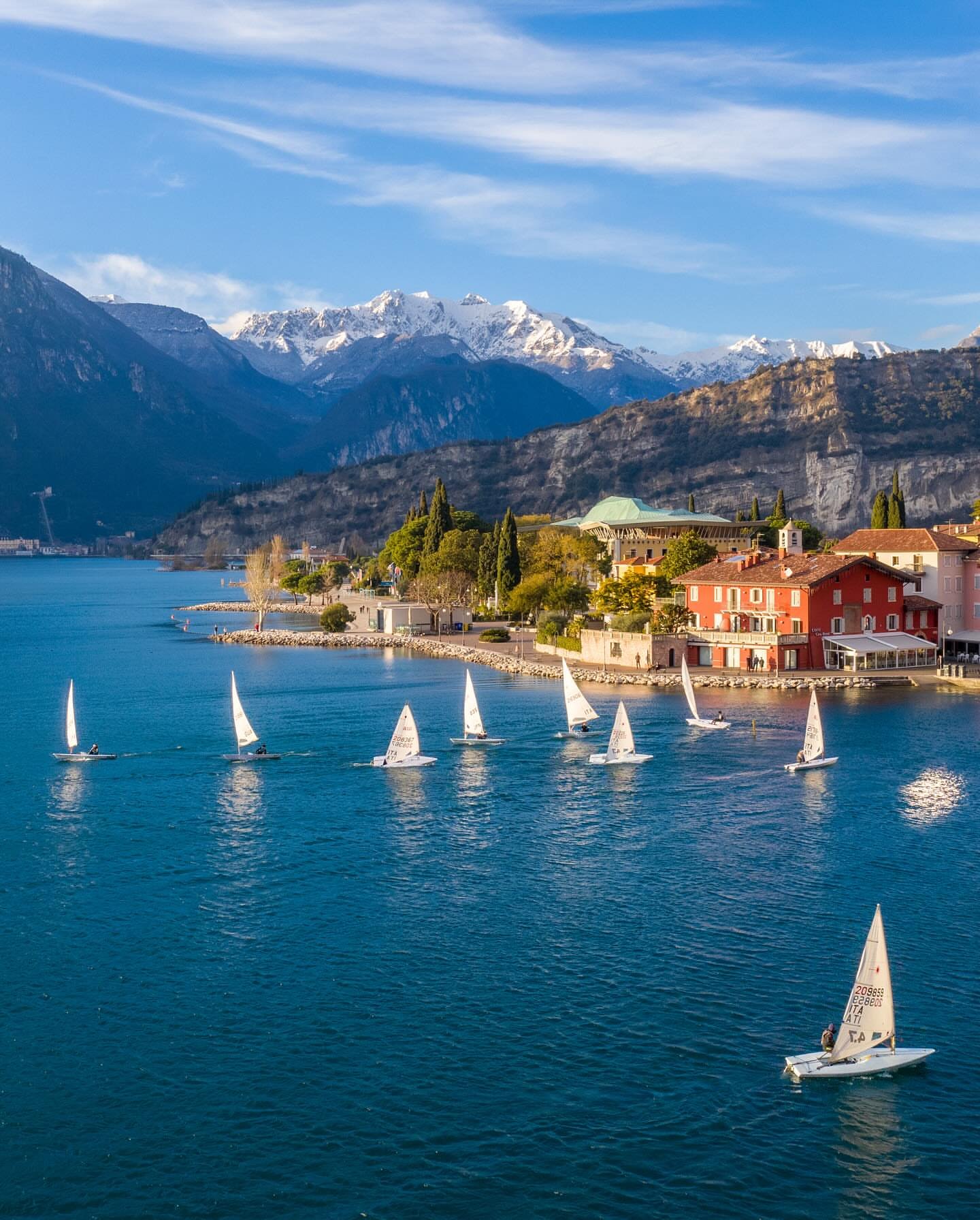 Sailboats racing on northern Lake Garda